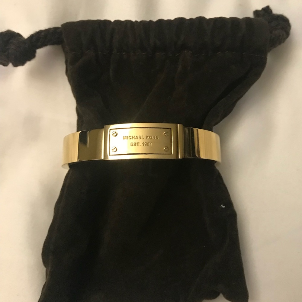 Michal Kors Gold tone bangle